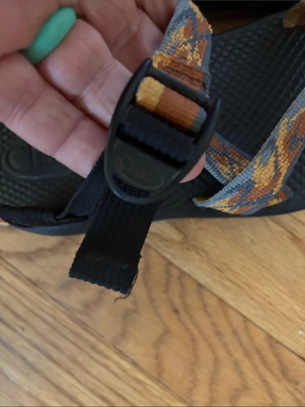 Chaco Black Sandals with Orange and Tan Patterned Straps